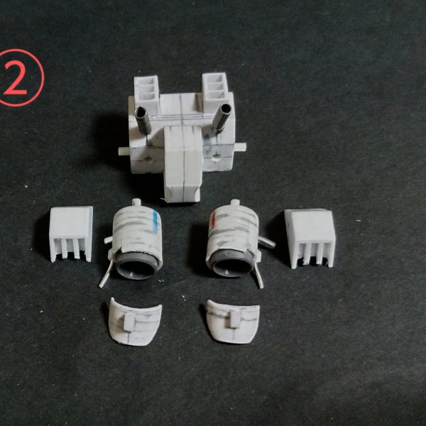 ガンキャノンバックパック製作。いろいろ選定に迷いました💦、意外に同時期の連邦系のMSでは大型のバックパックが無いんですね😭、そこで結局ガンキャノン2の物にしました！資料としては、私のコレクションの旧キットMSVガンキャノン2のを。袋を開封するのが勿体ないので塗装図からスケールアップして寸法をとりました。①の画像で今回も積層プラ板削り出しで製作しました。②の画像でバーニアとスプリングを市販品のを使用。塗装の時に楽なように軸を付けて分割式にしました。③の画像で本体のサイズに合わせて少し各部の寸法を調整しました。これで装備関係の製作を終わらせて、次回よりスジ彫り加工になります🙏（5枚目）