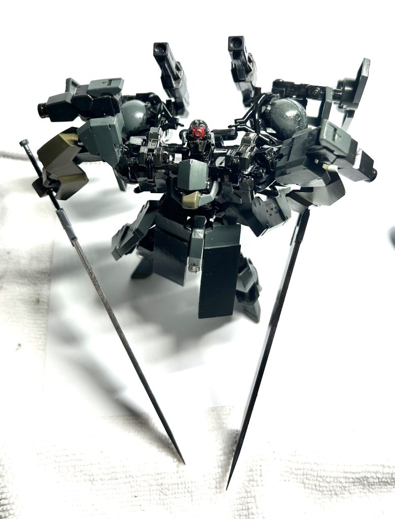 ある企業の秘密兵器–3枚目/制作者：ジオニックの社員