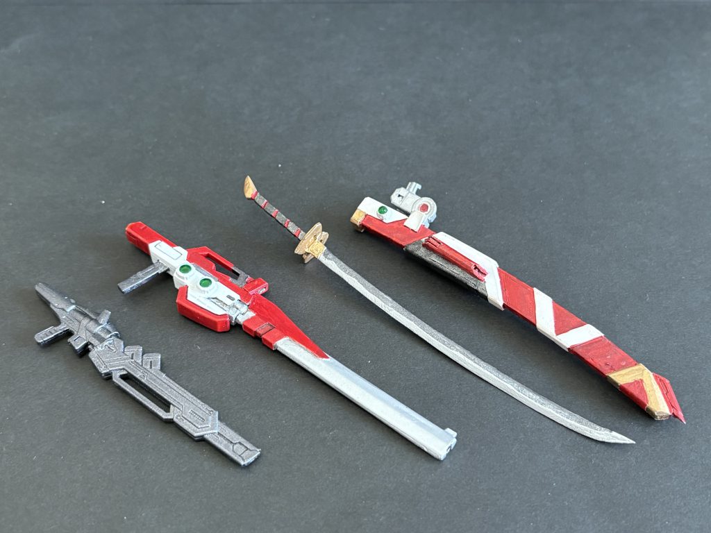 こちらはアストレイのライフルにカレトヴルッフ炎の銃口パーツをくっつけたものですね。