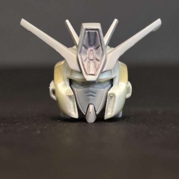 HGUC ZZガンダムをversion Ka顔に寄せて行こうの第4週(〜3/22)です。出張で2日空けたのでゆっくりペースです。①ヘルメットの上部に肉盛りました。②アンテナ延長中。いいかなぁ〜と思ってたら写真撮るとうねうねしてますね😇長すぎたか笑③ハイメガキャノンは筋彫りが太かったので段差にしようといじってたら傷だらけです。④ヘルメットと顔の傷取りはほぼ気にならなくなりました。他はもう少し傷取りに励みます。そうそうGrok。無料生成出来なくなった??ちょっと楽しみ減りました。なんかいい画像生成アプリないかなー。ではまた来週頑張ります。いいねありがとうございます。とても励みになってます😊(3枚目)