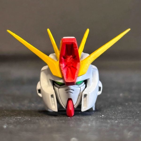 MGカトキフルアーマーZZが買えなかったらHGUC ZZを寄せていこう第五週（〜329）です。表紙は斜めから。このアングルはいつもだいたいかっこいい笑。次の画像は最新。2枚目は前週。への字スリットの掘り直しやらアンテナ削り込み、傷とりをやってました。ハイメガキャノンの傷とりはもう一周かかりそう。やり直すたびにシンナー風呂につけてるので母材はヘロヘロです。そろそろ決着つけます。ハイメガの外周溝入れ直すか段付け直すか‥ほぼパテになってきたのでなかなか難しいです。グッとやるとパキッって😆来週はひょっとしたら色ついてるかもちなみ最後にGrokで仮に色付けしてみました。ツインアイ周りは微妙ですがだいぶ近づいてきたんじゃないかなと思います。最後の画像はwebの拾い物のサンプルKa。これが見本で今までやってきました。主様画像ありがとうございます。（追記）5枚目に着色画像を生成し直しました。いい感じ😊モチベ回復。ハイメガキャノンの仕上げと現物塗装頑張ります。（6枚目）