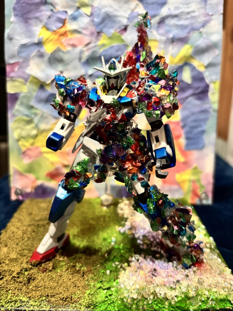 足元にビーズなどを塗してレジンで固めていきます。