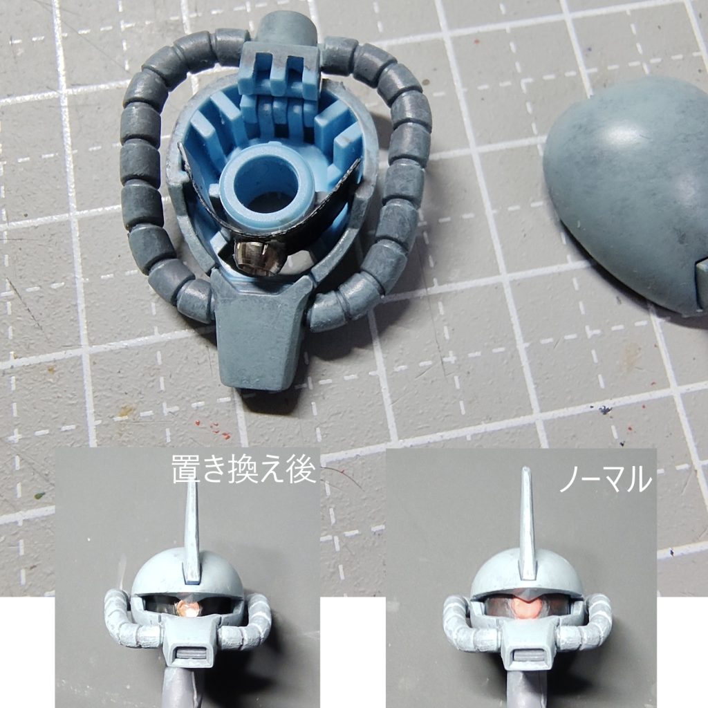 ちょっとだけやった事書いておきます。モノアイは、ハイキューパーツの金属パーツ+WaveのHアイズですが、これだけ元のパーツに貼ろうとしてもひさしに干渉してダメです。HJの作例では、元のモノアイ+レールの筒状の部品を「適当なプラパイプで置き替えました」とさらっと書いてあるのですが、そんな適当なプラパイプは見つかりません。考えた挙句0.3mmのプラ版を横長に切って真ん中にモノアイのパーツを貼って、曲げながら頭の部品に挟むだけ。頭部内部で左右に動けるようにマージンをとっておけば稼動できます(外からモノアイを引っ掛けて動かす)。