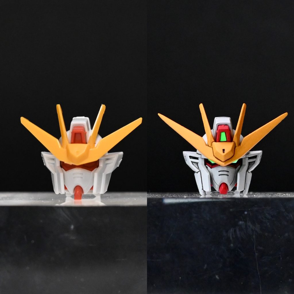 頭部改修は、頬を0.5ミリずつ前に出し、耳の下を0.5ミリずつ延長しています。またツインアイは削り落とし、蛍光グリーンのシールで自作しています。アンテナは先端の延長＆シャープ化に加え、中心部を鋭利にしています。