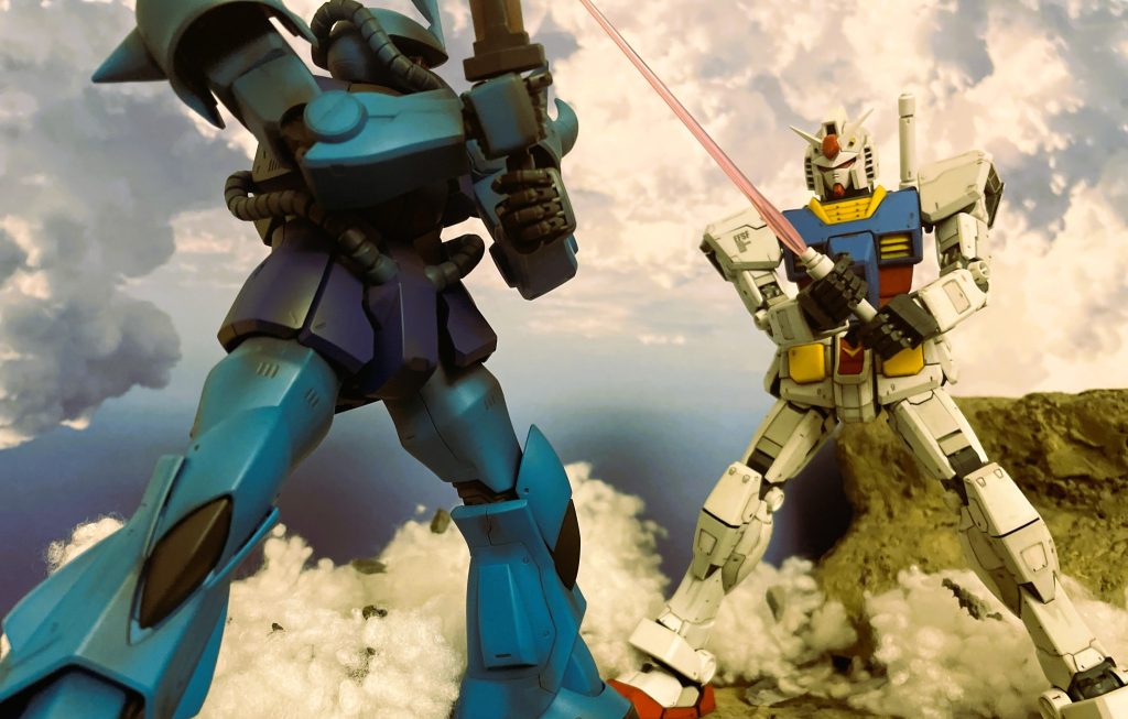 居合のごとく互いにサーベルを構え間合いを詰める両雄。