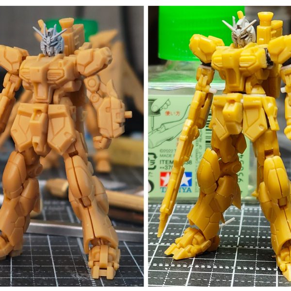 【ガンダムアーティファクト νガンダム改修①】ガンダムアーティファクトのνガンダムのスタイル改修狙いの可動化していきます。【脚部】①足首のTジョイント化。分離し、軸打ちしたいのでスライスして穴あける。②足首の横可動のため、軸打ち。③膝可動化。分離し、ネオジムを接地面に埋め込む。④もも側のディテールパーツを分離し、スネ側に接着。【胸部】①腕の付け根にBJの受けを移植するスペースを作る。②WAVEのBJ-03のBを使用。①で作ったスペースに入るようにカット。2㎜軸が使えるので、首下にある穴を2㎜まで拡張して使用。③はめるとこんな感じ。腕側の肩の可動はホビーベースの関節技球体ジョイントミニにBJ-03のボール軸の頭を移植いたものを使用。④脇下のディテールパーツが厚すぎると思ったので、半分にして再接続。【腕部】①、②のようにパーツ分解。のこ先が入りづらく苦戦しました。②軸ピンをプラ棒でつくり、可動化。③腕付け根のBJ受けにディテールを戻す。④二の腕に軸受け(2㎜穴をあける)の補強のためプラ板で。【腰】①上半身、下半身に分離し、下半身側に1.2㎜のプラ板で腰の厚さUPと2㎜軸ピンを打つ。②ふんどしアーマー部分を増幅した分上に移動。ふんどしアーマーの下が長すぎるのが短足にみえるので、スラスター部分からカット。③腰のフロントアーマーも大きすぎると感じたので、一回り縮小化。④フロントアーマーはプラ棒で軸打ち可動化。サイドアーマーはネオジムで。リアは可動化無し。【首まわり】①首まわりを少しさげたいので、後頭部側の襟を削除し、ヤスリなどで削る。②頭部の側でのBJ化。首のパーツ制作。ボールを接続部に設け、頭部側は首を除去し、エポパテで埋め、ボール受けをつくる。顎引きができます。【ノーマルと比較】腰の厚さとふんどしアーマーの上移動で足が長くなしました。次【ガンダムアーティファクト νガンダム改修②】(7枚目)
