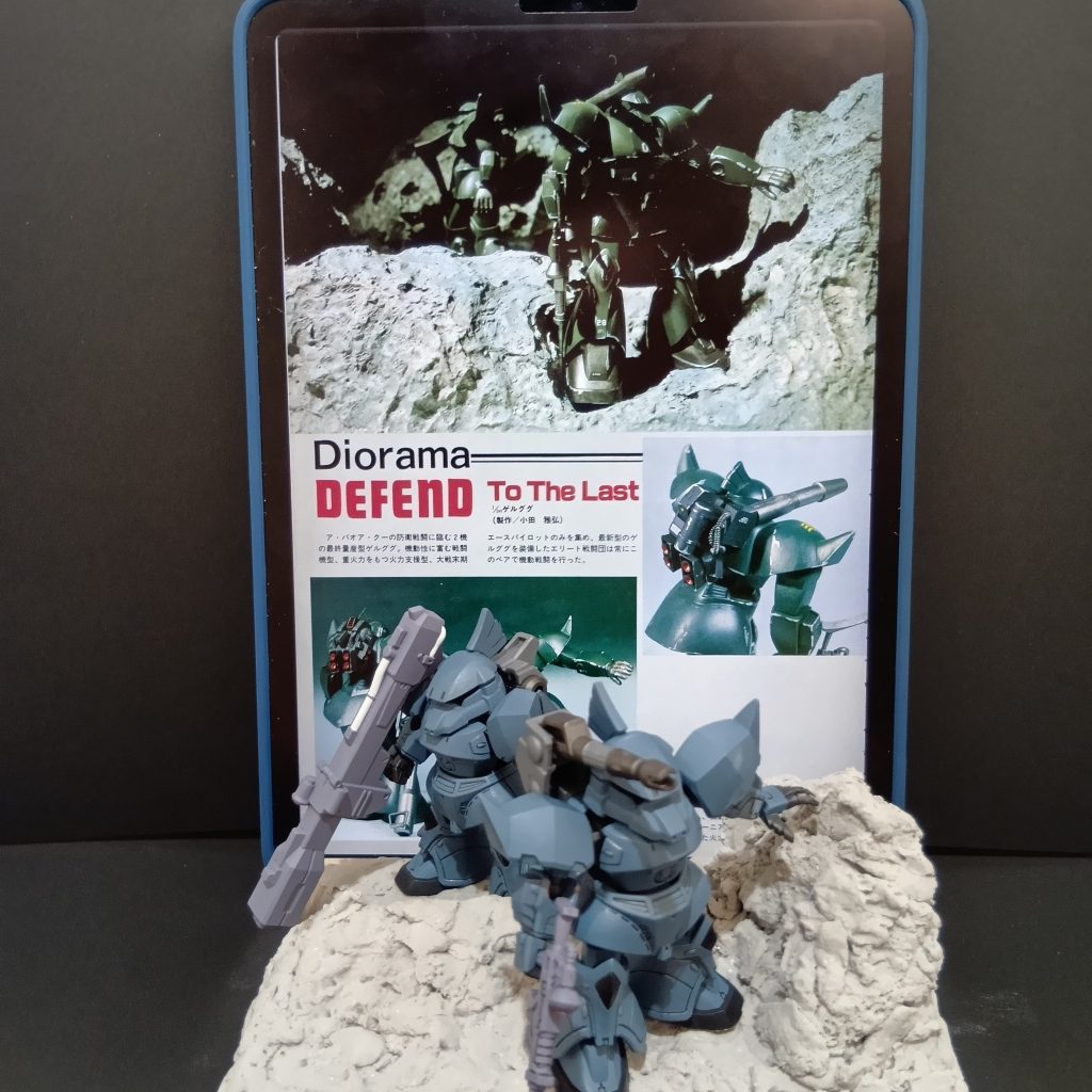 　目指したのはこれです。ア・バオア・クーに配備された高機動型バックパックとキャノンパックを備えた2機のゲルググ、という設定だそうです。作例では本体はダークグリーン１色で塗装されていますが、以前作ったガンダムがグリーン系であり同系色で塗るのは面白くなかったので個人的に好きな色のブルーグレーで塗りました。