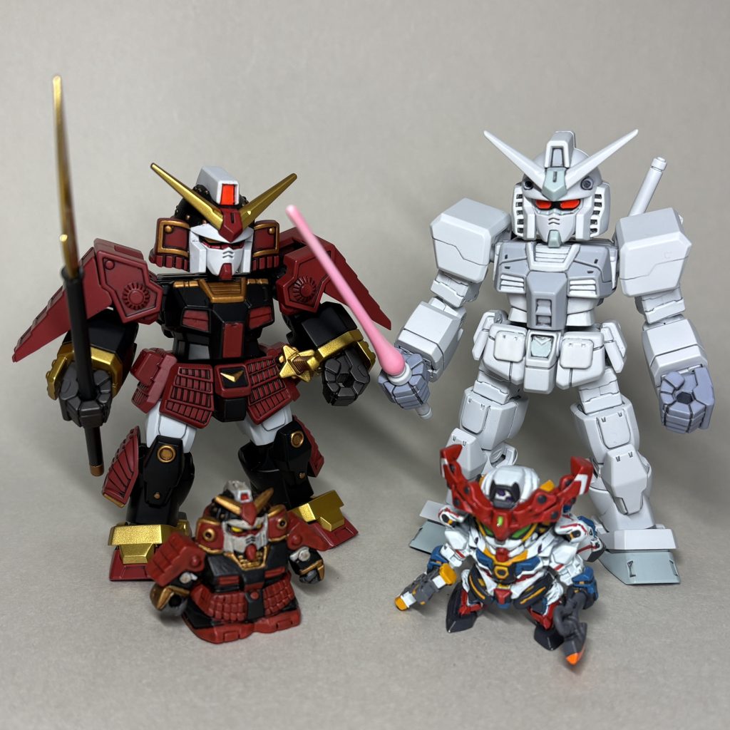 ハイパー化ガンダム(GQ)、ガシャポン戦士等と並べて武者頑駄無のガン消しを塗って見栄えがすると感じたので、ブロックロスのどれかを買おうと思っていた中から武者ガンダムを選択。ガチャポン戦士ZERO01のジークアクスが当たり、ブロックロスのガンダムを白く塗りたくなって購入しました。購入動機なんてそんなものです😅