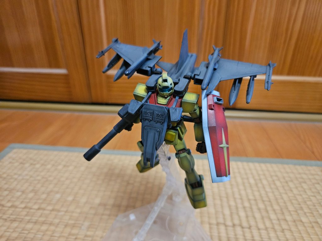 ドップ戦時にジャンプで応戦したガンダムのデータを参考に滞空時間を延ばすために考案された装備で、試作で一機作られたがその後の所在は不明となったそのデータはコルベットブースターやGブースターに引き継がれたhttps://gumpla.jp/hg/2346105
