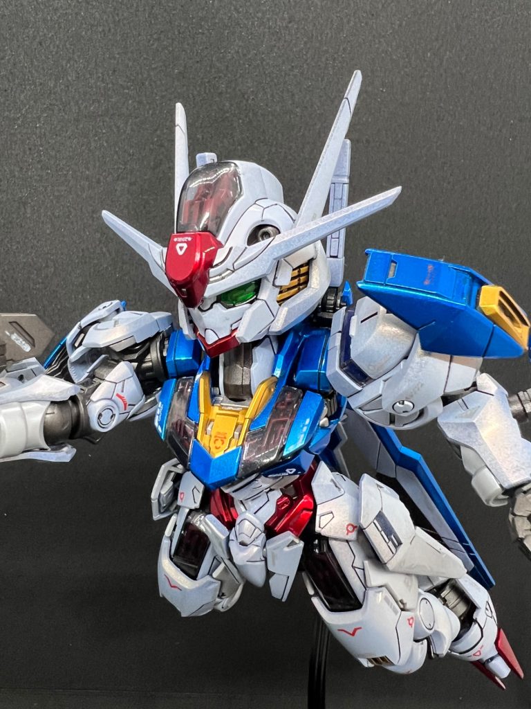 EXブラック→スターブライトシルバー下地でGaia クリアーブルー、クリアーレッド、クリアーホワイトのお手軽キャンディパーメットスコアの部分はブラックライトで光るようにしてみたキャンディホワイトは初めてやってみたけど、磁器のような青味が出て綺麗この感じならエグザベギャンにも似合いそう