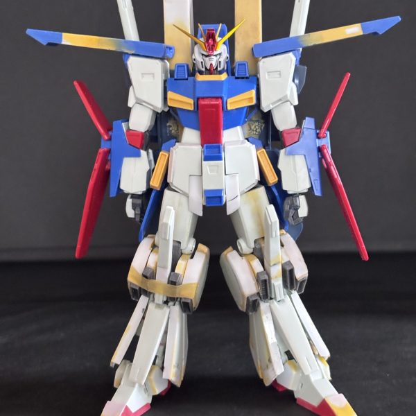 MGフルアーマーZZ verカトキにHGUC ZZを寄せて行こうの第10週（〜5/3）です。脚はふくらはぎのパーツ作んないといけないですけど、見た目を変えたい（笑）ので強化型の特徴的な部分を手をつけてます。肩アーマーは10mm延長（なんか分厚いですね）腰の前掛けはツノつけました。バックパックは32mm延長というか上半分をプラ板で作りました。ミサイルポッドのピッチは5mm広げてます。考えなしに切断したので中心線出すのが大変でした。切断は計画的に🤣引き続き粉まみれです。まだまだやることいっぱいあります🤣&nbsp;（2枚目）