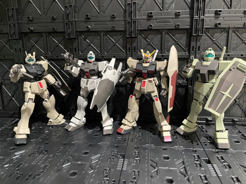 『アデルハイド隊』一年戦争末期、連邦軍内部で極秘に進行していた「ホワイトベース隊再現計画」。士気向上を目的とした“新たな英雄部隊”の創設計画ニュータイプや突出したエースに依存せず、高性能MSによる実戦運用を目的として編成された特殊戦闘部隊――それが《アデルハイド隊》である。中核を担うRX系統機を中心に、その僚機には最新型ジム系MSを優先配備。RX-78系の戦闘データを基に、ジム系・RX計画機・各種試作機の規格を統合することで、高性能と整備性を両立した。後にジオンの『銀の弾丸隊』と激しい戦いを繰り広げることになる。