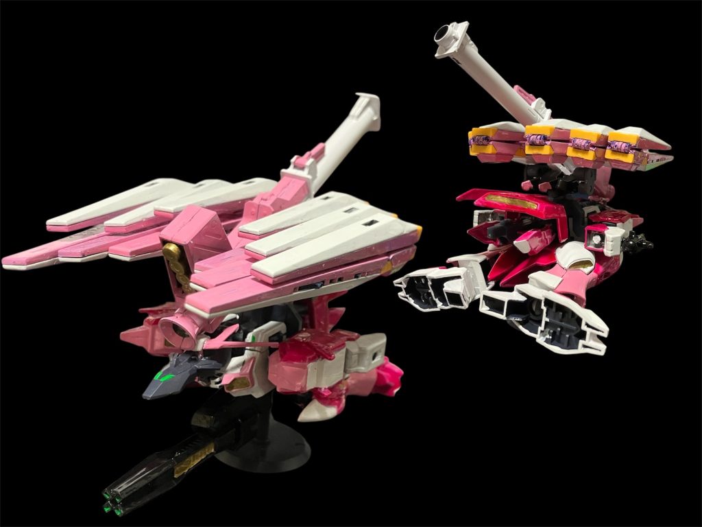 ブロッサムアーマー。フェイクνアーマーをベースにνガンダム　さくらみこカラーに寄せて塗装し、オプションパーツフィンファンネルとハンドミニガンやバズーカを組み合わせてみました。