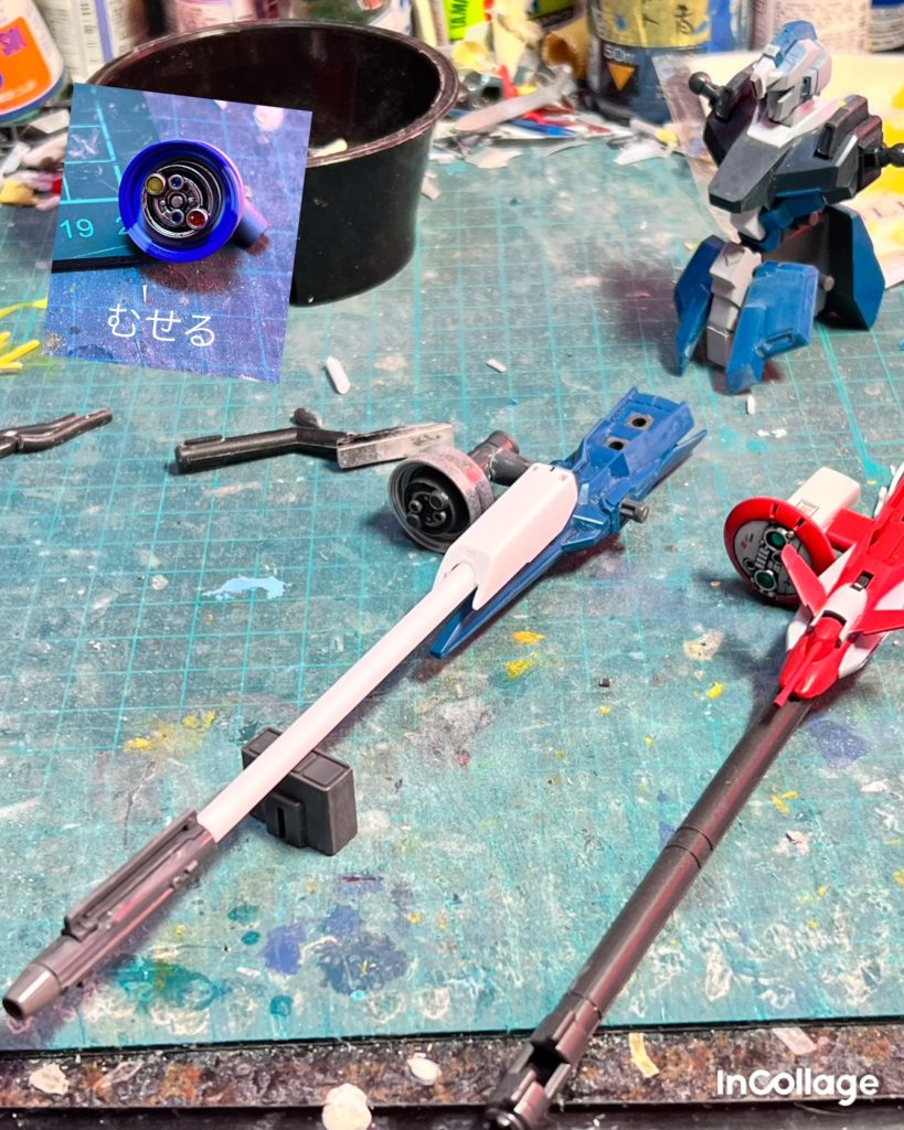 捏造ビームスマートガンの砲身はプラパイプと武器のジャンクを組み合わせて作りました。スコープは車プラモのホイールを使いボトムズのスコープドッグを意識して、バーニアノズル小をレンズに見立て貼り付けました。