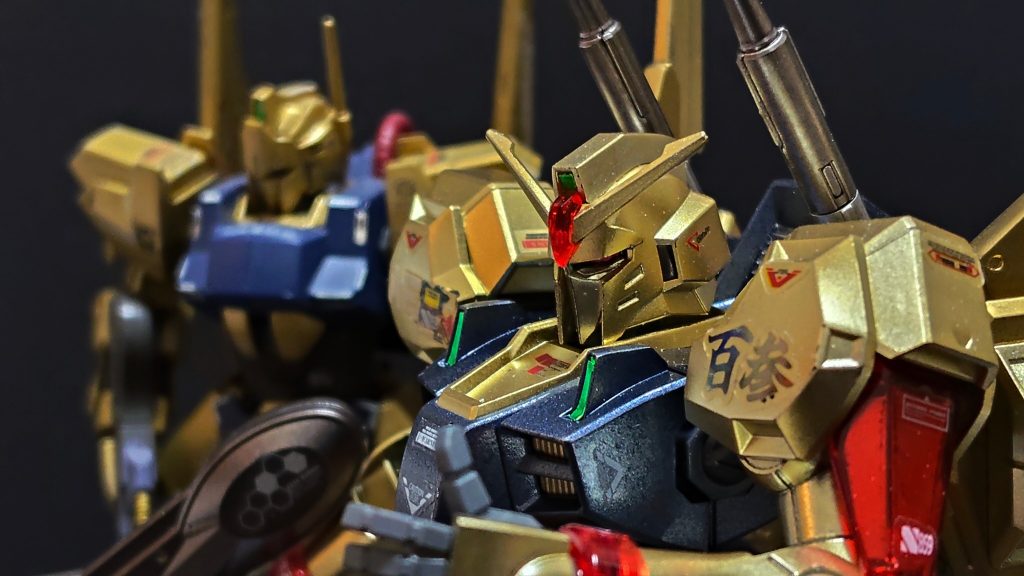 3.&nbsp;&nbsp;&nbsp;&nbsp;ウォンの意向により、AE社は当時エゥーゴの擁する最高性能機であったZガンダムと百式の最新運用データを全面フィードバック。ガンダムMk-IIIのフレームをベースに、両機の長所を高次元で融合させるた「百参式」の開発は急速にピッチを上げることとなった。
