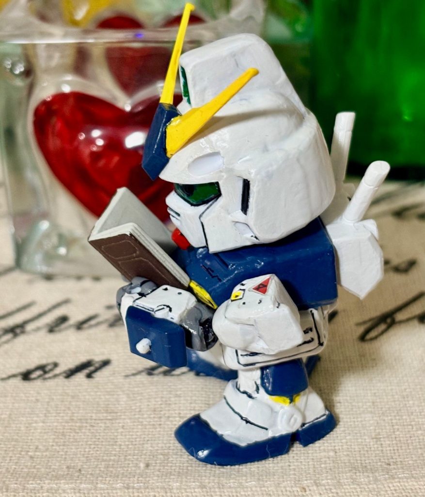 ゆっくり読書をするアレックス君(gundam-kao6)