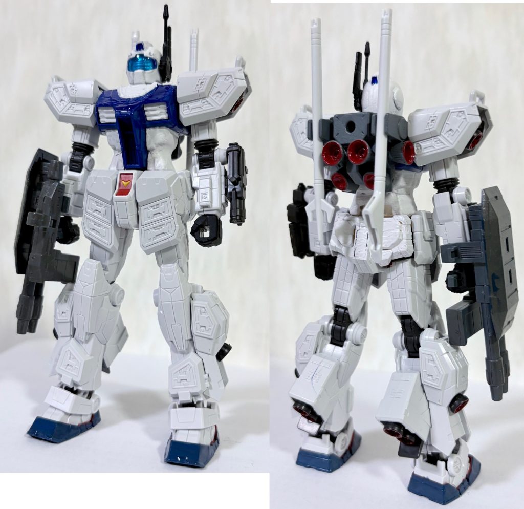 フロントビューとリアビュー。以下レシピ(zaku-kao5)・ボディはEG万博ガンダム・頭部はジムナイトシーカーの余った頭部。・バックパックはラー・ガンダムのモノをコトブキヤのバーニアで加工したオリジナル仕様。・右腕の二連装ビームキャノンは雑誌かなんかの付録を装着させた。・左腕についているのがIフィールド。ちなみにカラーリングは、ちょうどワールドカップの開催期間なので日本代表応援の意味を込め、青と白のツートンカラーにしている。
