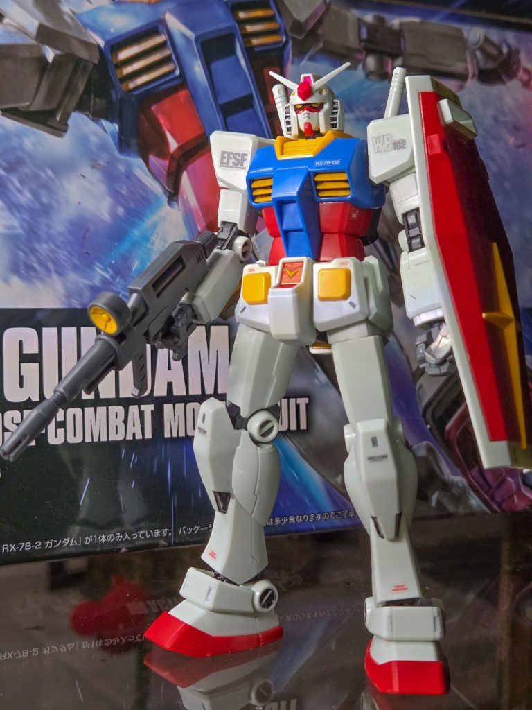 I redid face and certain details with a grey gundam marker. It made a huge difference! Also added decals from origin hg kit.