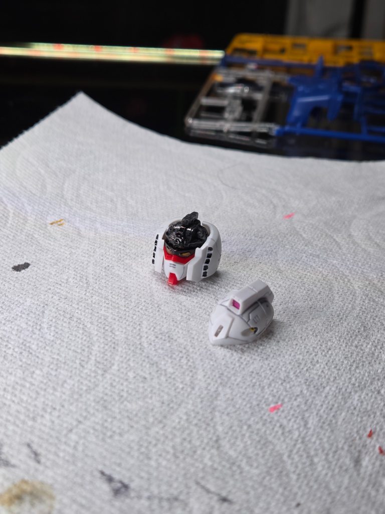 Top of head comes off which is unique to just the MG 1.0 kit.