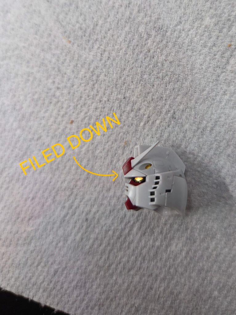 I used a metal file to shave down visor to give the head a more classic look