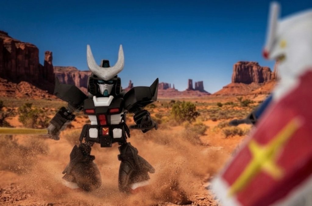 ガンダムvsゲルダム。構図は仮面ライダー1号対ショッカーライダーをオマージュ。