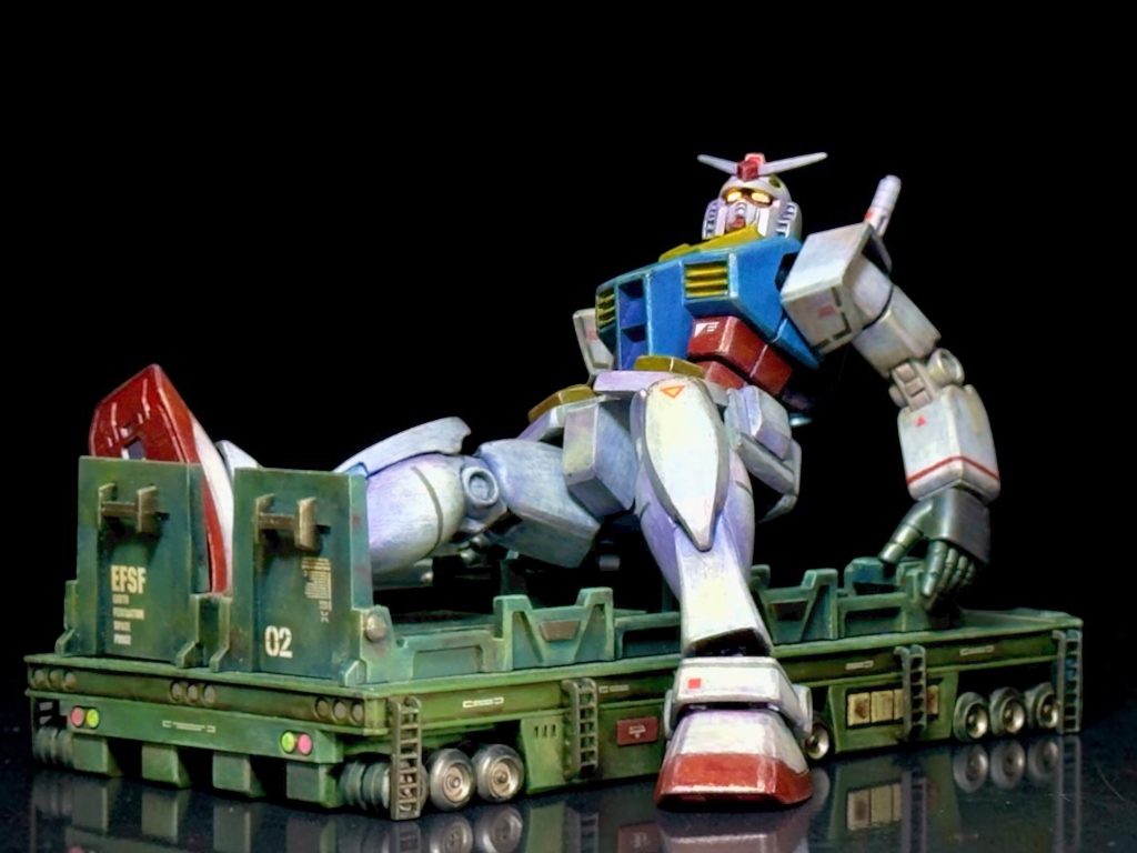 ガンダム大地に立つガンダムトレーラーは成型色にマーカーペンで部分塗装、デカール貼ってドライブラシ、ウェザリングで仕上げました。