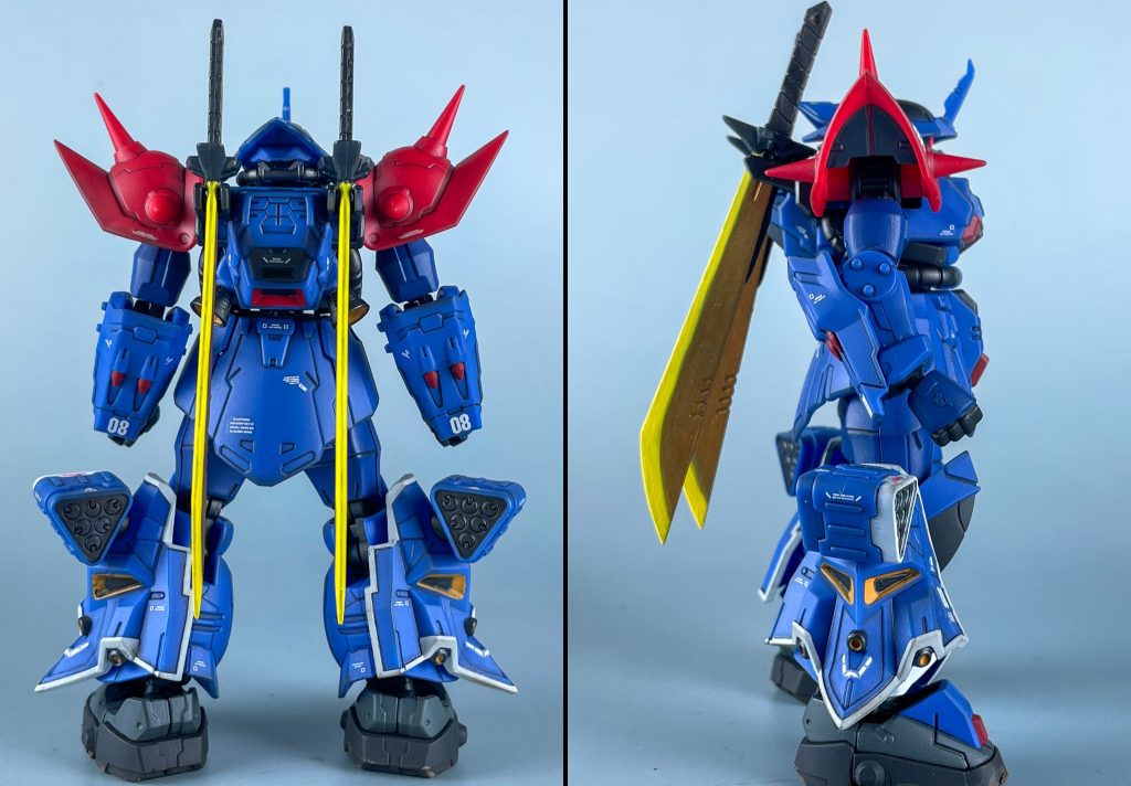 立ち姿。ま〇だらけでアーマーセット・フレームセットがニコイチで安く売られていたので購入。ジオン系Gフレーム特有のマッシブなプロポーション。ヒートサーベルは背中にマウント可能ですが、腰へのマウントはオミットされています。バックパックのバーニアが少し小さいと感じたので、市販パーツのものを接着しています。&nbsp;【塗装箇所：使用塗料】全部シタデルカラー。二の腕、手甲、太腿：マクラーグ・ブルー腕部グレネード、各部バーニア： メフィストン・レッド脚部サイドアーマーのライン：コラックス・ホワイト脚部サイドアーマーのスラスター：アバーランド・サンセットミサイルポッド：セレストラ・グレイ足の甲：メカニカス・スタンダート・グレイ
