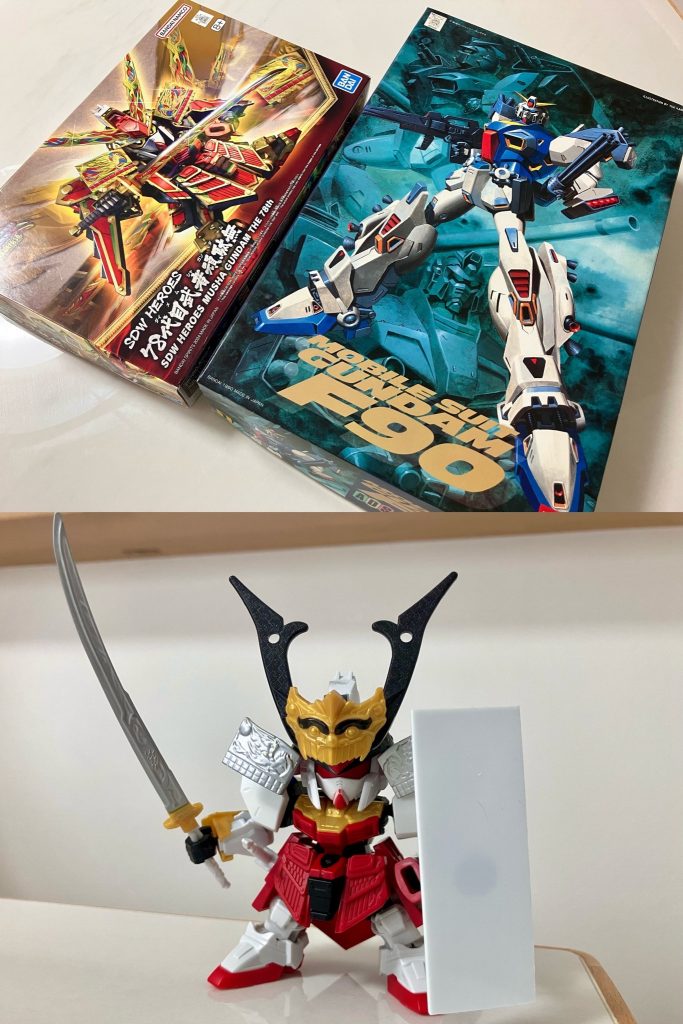 SDガンダムワールド設定の源九郎義経ガンダムを作りました。F九rOと書いてF九郎と読みます。演者MSのガンダムF90は、劇場版『機動戦士ガンダムF91』のスピンオフとして、1990年から多様な媒体でマルチメディア展開されてきたMSV的外伝作品群の主人公機です。近年はプレミアムバンダイでのMG 1/100規格「F90 A to Z PROJECT」が始動し、ガンダムF90とアルファベットの頭文字を冠する26種類のミッションパック装備が豊富にバリエーション展開されています。このたびX（Twitter）上でSDガンプラ愛好の有志による #SDミッションパックAtoZ 企画が開催され、26種のミッションパックを題材としたオリジナルSDガンプラを主催者様・参加者の皆様と共に製作し、その中で寒冷地仕様のCタイプを担当させて頂きました。