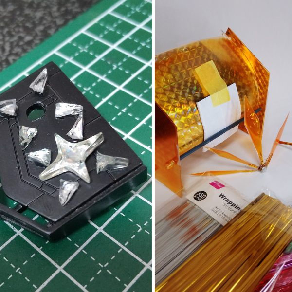 ①透明プラ板でカードベースを作成。背面はC字に曲げ、そこに側面を3ミリ軸で接続。UVレジンで複製して作ったちくわ状の３ミリ接続パーツをつけて隙間なく固定する形。やや斜めに傾いて採光できるようにしつつ、キャラを空間として包めるような形に。②ホロ部分はダイソーのホログラムデザインペーパーをテープで付けただけ。適当に何枚か買ってきたものだけど、最近仕様変更したのか輝き方が良いものと鈍いものがあるので、より輝いてる方を使用。額縁となるカードフレーム部分は同じく100均の連結ディスプレイベースの端を切り取ったもの。ネームプレートと太陽マークの土台部分は３０ｍｍのティルトローターのパーツ。ゴッドガンダムの名前部分はＲＧシャイニングに付属のランナーから。カードフレームは当時もちょっとダサさを感じてたので、ついでに立体物として奥行きを見せられるような形に少しだけアレンジ。③透明プラ板はクリアオレンジで塗装。回転させて横の側壁が見えてもなるべくキラキラ空間が繋がって見えるように。側壁の外側に直接オレンジホロペーパーを貼るよりかはこちらの方が自然に見えたので。④カードフレームの太陽マーク部分は、100均の☆マークの型からUVレジンで作成。中には銀のホロペーパーを下地に透明ホロペーパーも少し入れた。☆部分の真ん中だけ丸くへこんだ造形になってるので、ホロの輝きだけでなく物理的な屈曲によっても表情が出せるように（写真だとほぼわからないが）。中心の☆は３ミリ軸接続、他の小さな部分はUVレジンの硬化で接着。硬化後のポロリが恐いのでUVレジンでの接着は少しはみ出すくらい塗ったが、見映えなど良くなるようにここはもっといい方法を考えていきたいところ。他の文字や数字も100均のレジンの型から作った。　背面の集中線のような演出パーツも作成。ダイソーのラッピングタイにUVレジンを薄く塗って輝かせつつ形を固定、数本を中心で束ねてネオジム磁石も添えてレジンで接着。このラッピングタイは空間に線のようなラインを入れるのに重宝しそう。　カードベース側にはマグネットシートをテープでくっ付けるだけ。後ろは見えないので適当。カードベースは底面と後ろも横にランナーを通して３ミリ穴パーツでさらに固定、中央と側壁の隙間をなくしていく。⑤物理的なキラホロエフェクトも製作。クリアオレンジで塗った透明プラ板に透明ホロシールを貼ってUVレジンを塗る。やや水っぽい質感になってしまうが、ちゃんと光を反射して存在感を持って欲しかったのでレジンは厚めに塗った。⑥右の側壁は縦に長いものも用意して、パース付きカードダスにもなるように。これでカードベース部分の工作はおしまい。（4枚目）