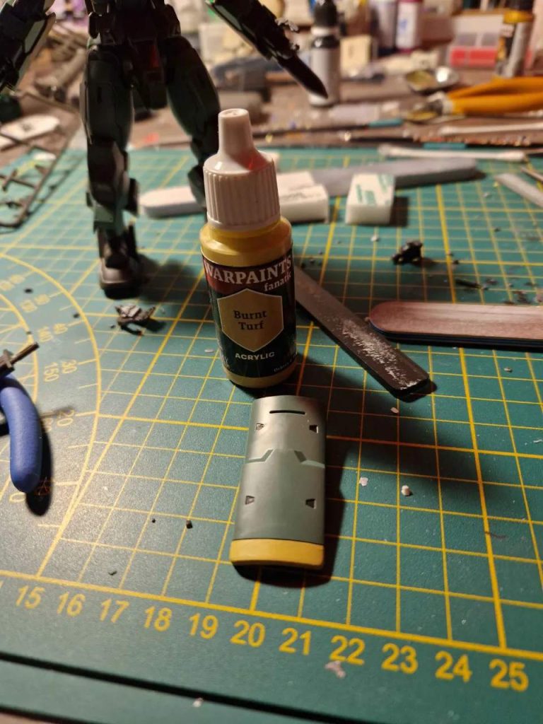 To avoid the beige sticker I used some acrylic paint to paint the under side of the shield. I finished off with a semi gloss topcoat.&nbsp;