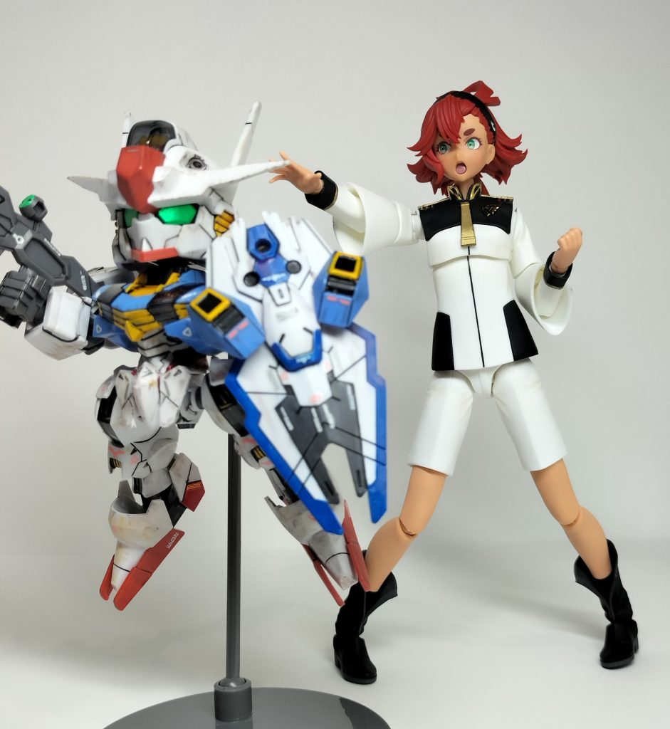 ポ◯モン風な構図で(gundam-kao5)スレッタ「いけっ、エアリアル！エ、エ〜スカッシャンですぅ！ 」エアリアル「 エアエアー！」