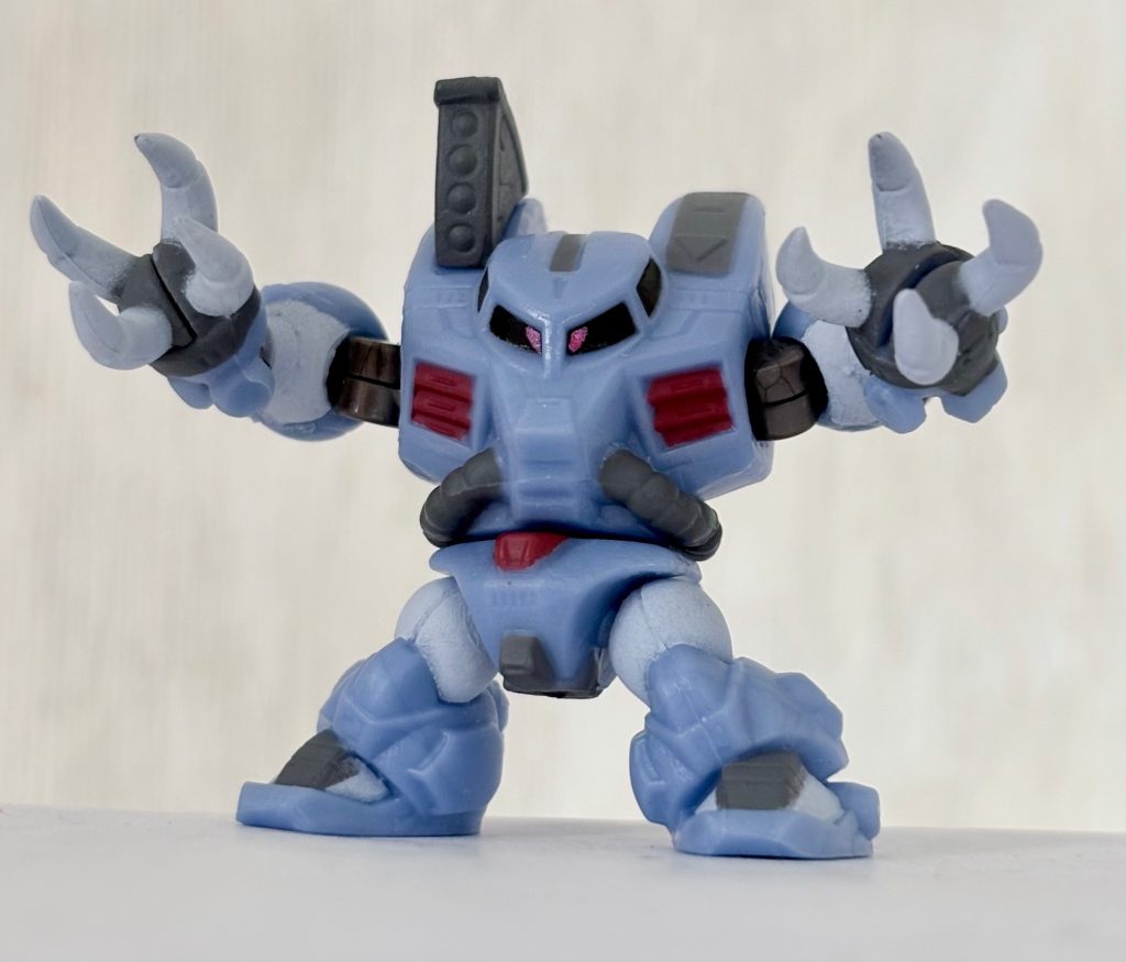 元々はファーストガンダムのトミノメモにて記載されていた機体で「勇将」の異名を持つパイロット、ダルの搭乗機として物語後半の第41話(メモによると、全52話の構想だった)に登場が予定されていた。隕石越しの山越えハンマーによる攻撃でホワイトベース隊を苦戦させるが、ガンダムの前に敗北した。