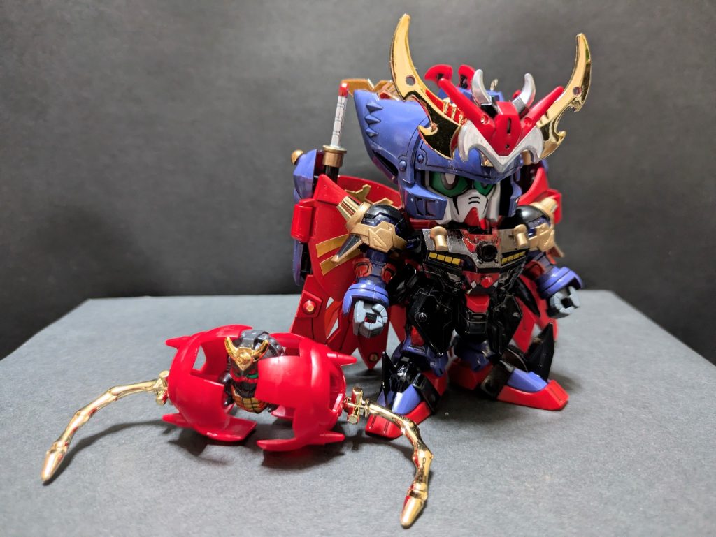 「超機動大将軍編」には三羅将・宇折墮として登場。このどこか可愛らしくて憎めないデザインが意外にお気に入りなので、できるだけ残したいという考えが暴走しました。