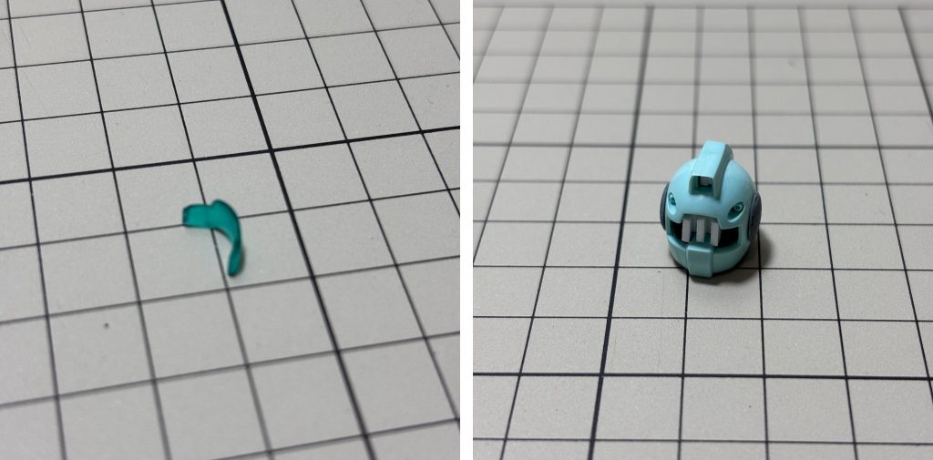 バイザーはキットのままだと接続ピンがくっきり見えてしまうので、ピンを切断。走査線ディテールごと丁寧にヤスって、番手を順に上げて透明度を元に戻しました。裏側を白く塗って、原作風なディテール少なめバイザーに仕上げています。接続ピンが無くなったので頭の内側にプラ棒で支持具を作って、「ハイグレード模型用」で接着しました。