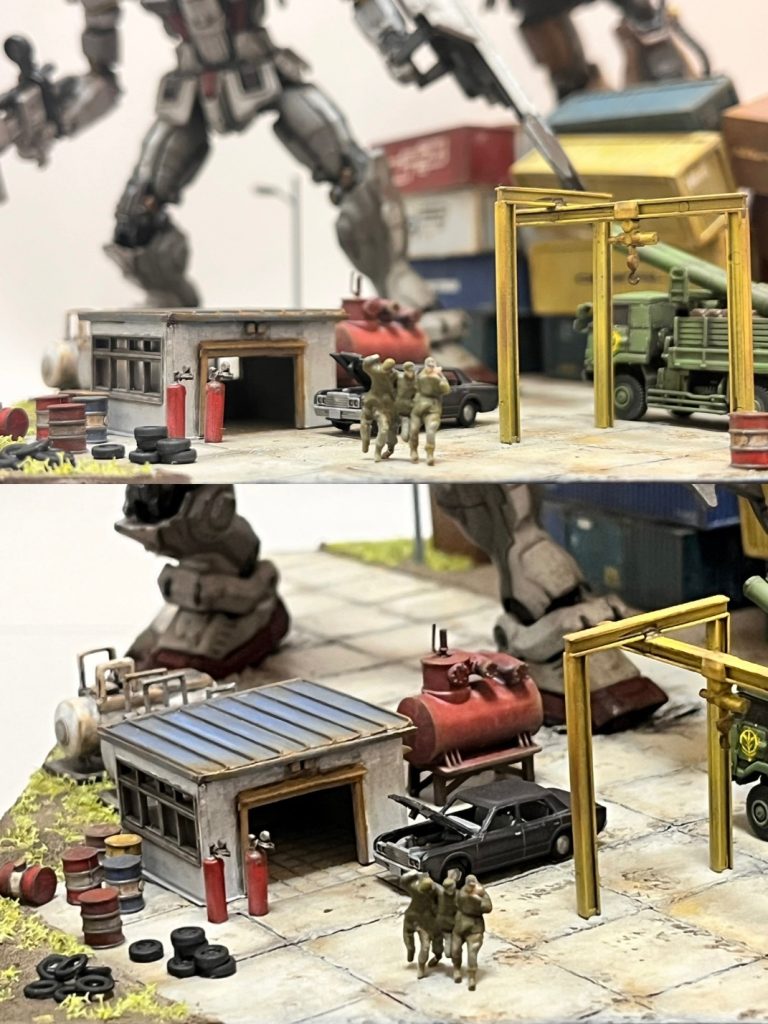 いつものフィギュアを添えて…😅3人は整備兵という設定。コンクリート土間はプラ板で作成。