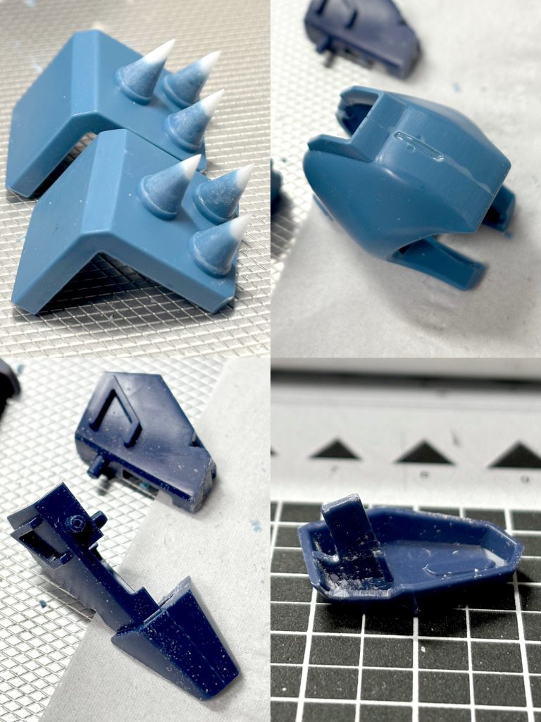 合わせ目消しと苦手な後ハメ加工も挑戦しまして、上手くいきました！スパイクも尖らせたりして。でも、仕上げが甘くてガタガタになっておりました。完成してから気づくんですよねぇ。あとサイドスカートに腰フレームと干渉する部分を削り取り、より根元まで差込める様にすることで、腰パイプとの干渉を無くして、より横に広がる様にしました。これで、より足を開く角度が増えました。製作時、つま先のパーツ切り離した時に0.1mmのタガネが折れました。地味に値段高いので、まだ買えておらず…。頼みの綱のボーナス出ないし…。大丈夫か、我が勤め先…。てか、積みプラ止めれば良いだけの話か。
