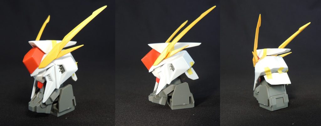 ■頭部の改造　キルケーの魔女版では新規のガンダムタイプのフェイスパーツが付属しますが、ノーマル版には無いため、フェイス部分をジャンクパーツとなっていたエントリーグレード1/144νガンダムから移植しました。　頭頂部のトサカと後頭部の襟足は、νガンダムの意匠に寄せた形状にしたいと考え、プラ板をコの字に組んで整形して取り付けました。
